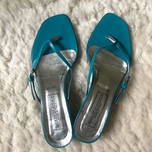 Turquoise leather flip flops